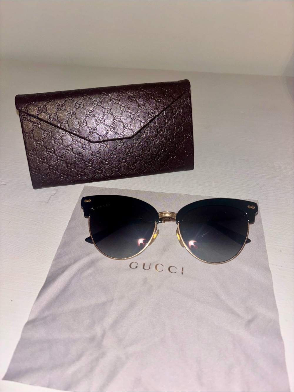 Gucci Black and Gold Cat-Eye Sunglasses